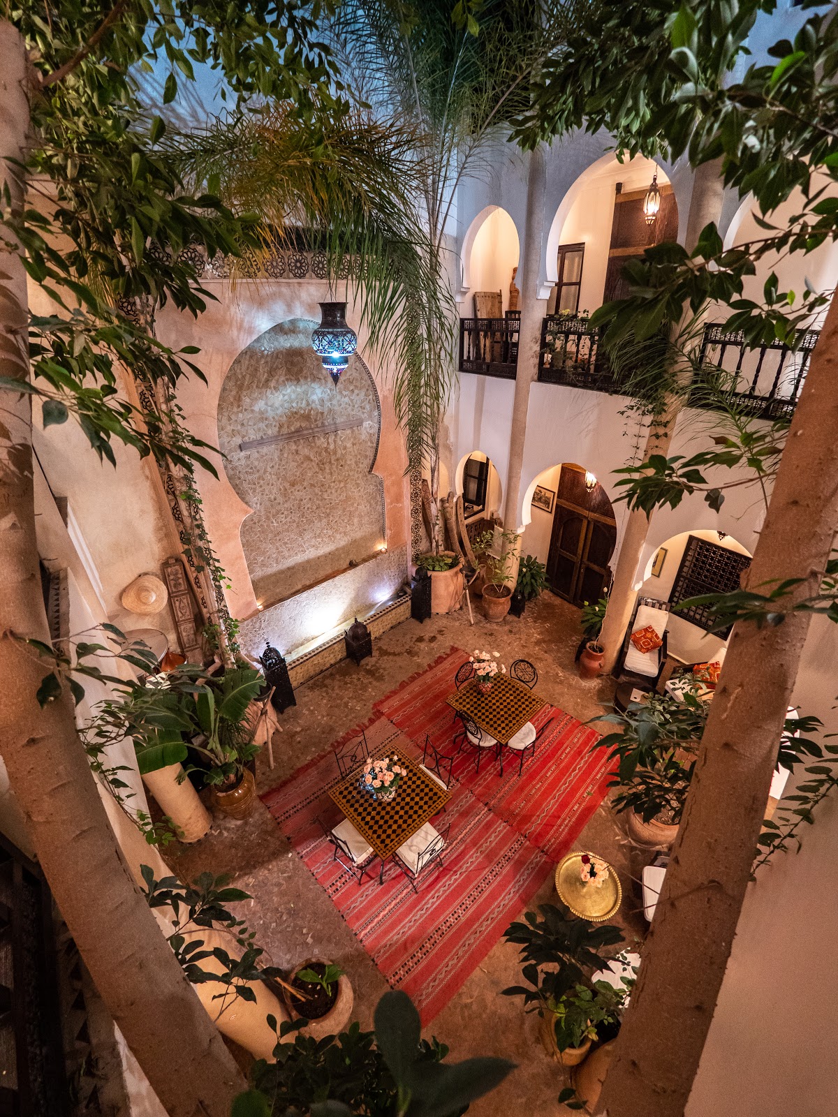 Riad patio with a pool and traditional Moroccan architecture
